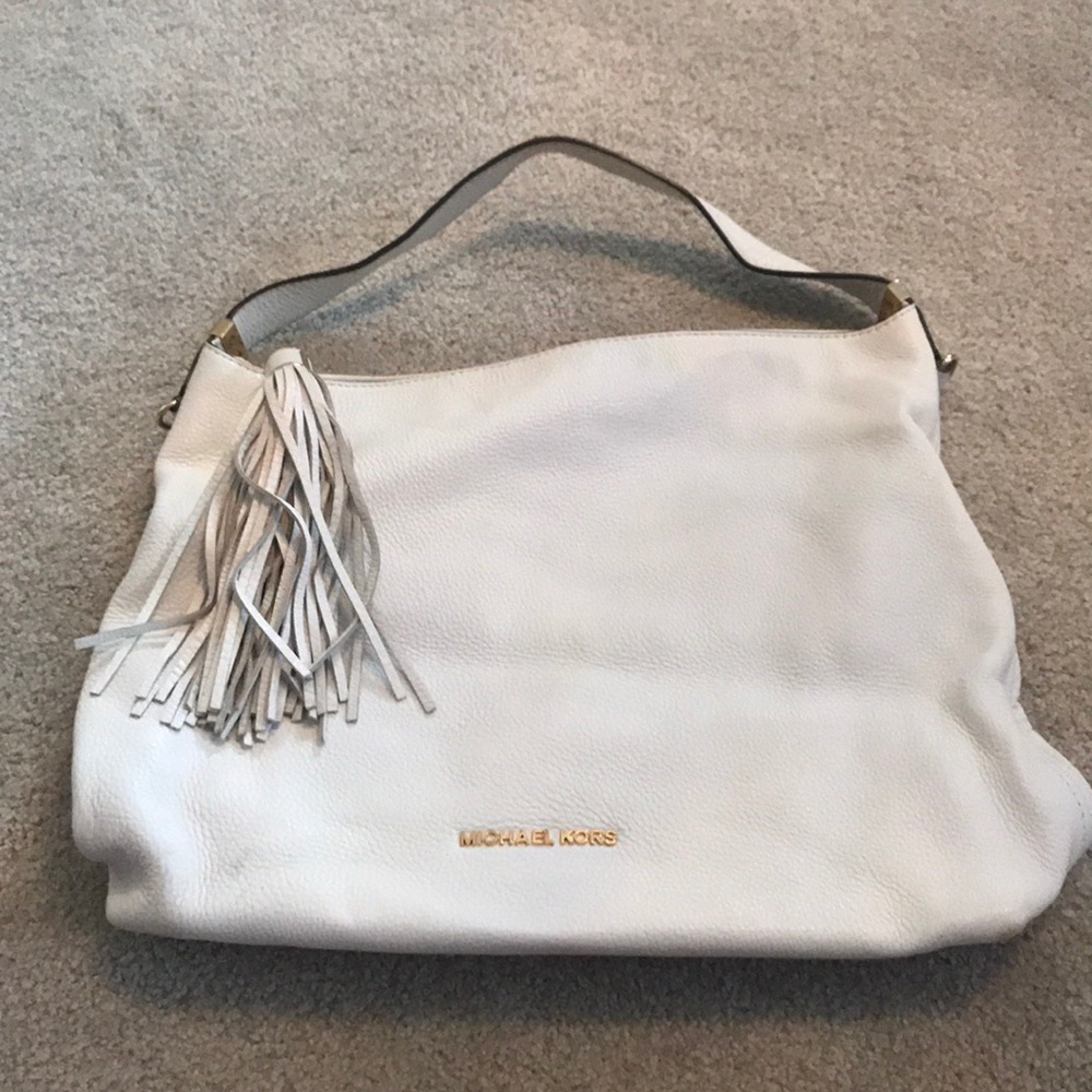 White crossbody Michael Kors bag